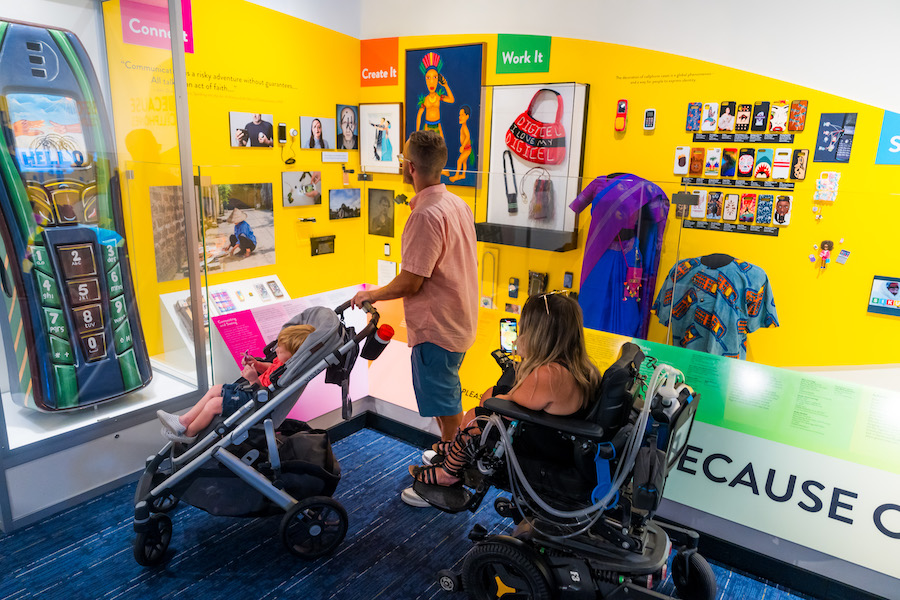 Family with baby stroller and wheelchair